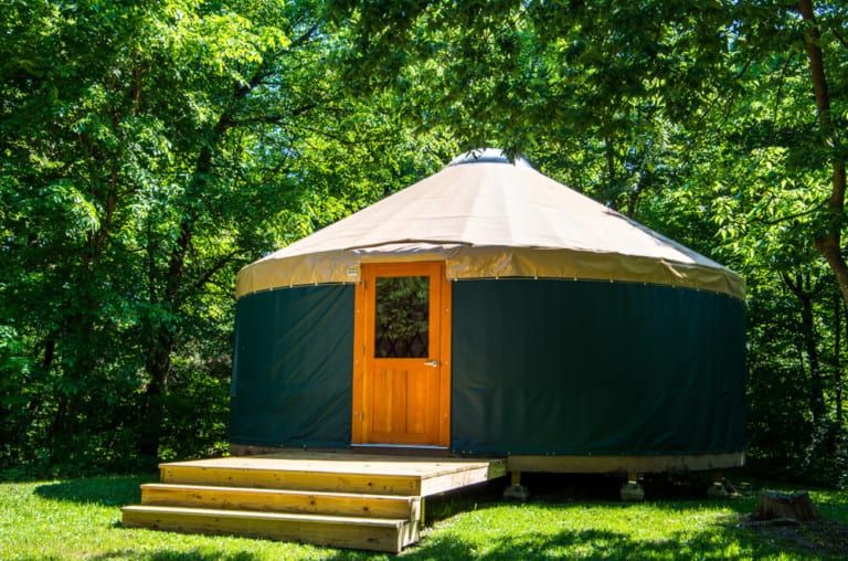 yurt exterior in the forest off grid camping