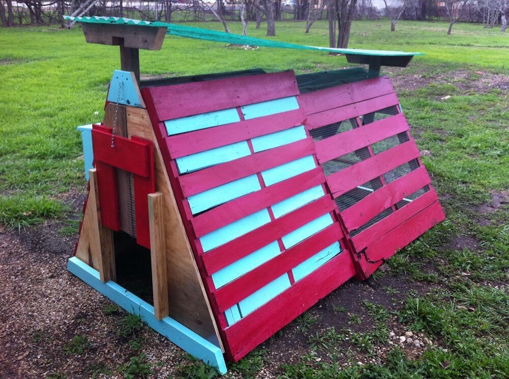 colorful red wooden pallet chicken coop