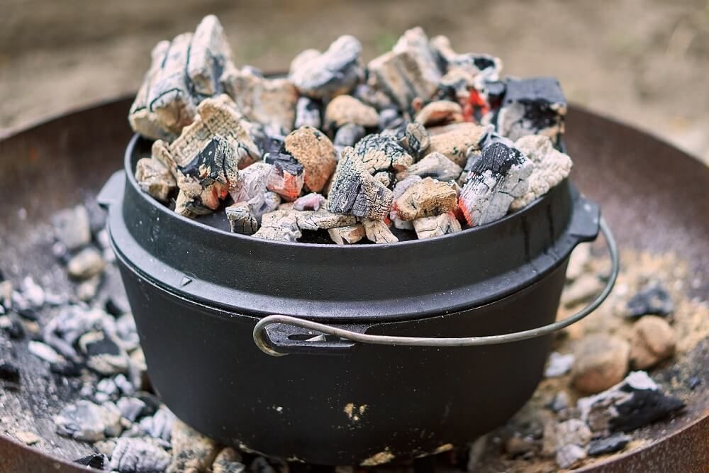 dutch oven with charcoals for baking