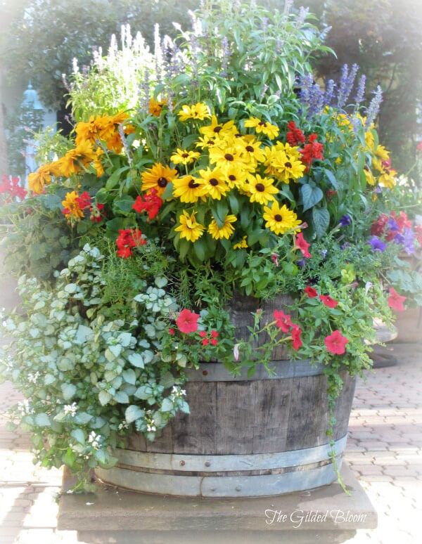 colorful wine barrel flower planter