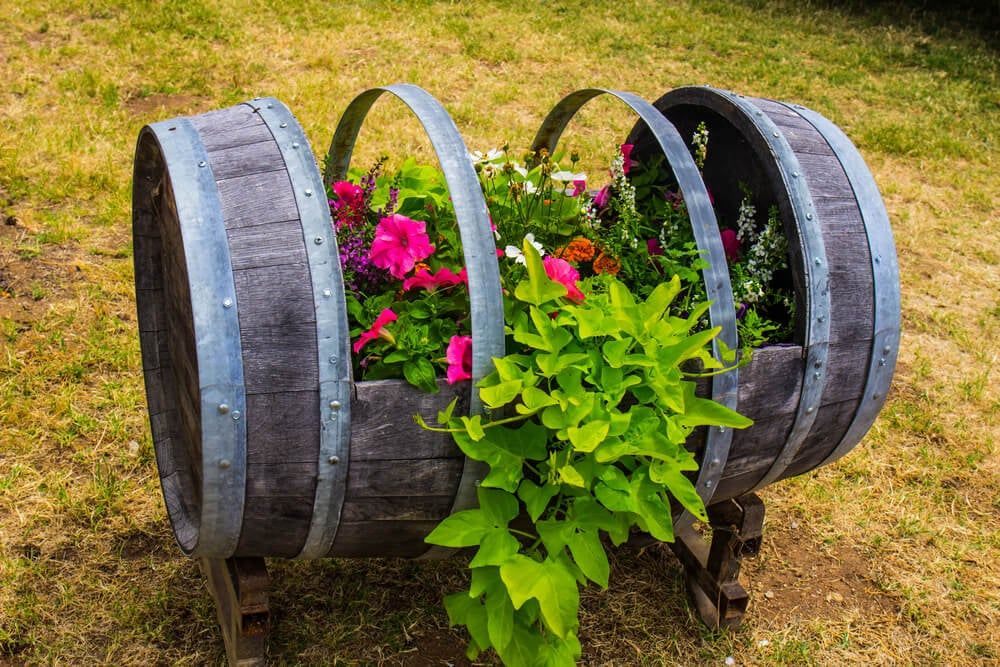 diy wine barrel planter on side