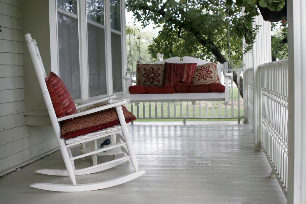 rocking chair and swing on porch