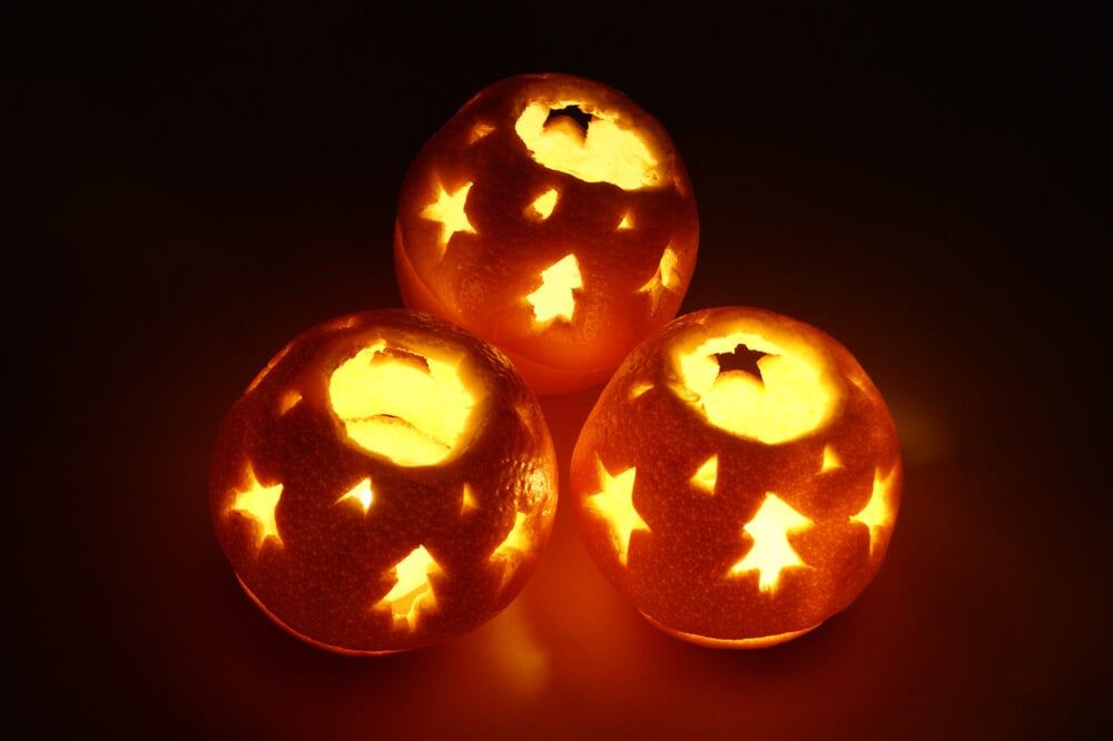 festive candlestick made with orange peels