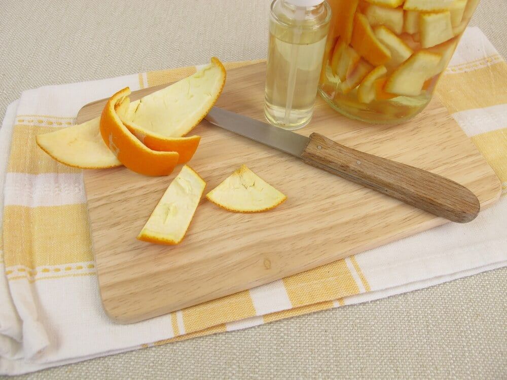 organic homemade cleaning detergent using orange peels and vinegar