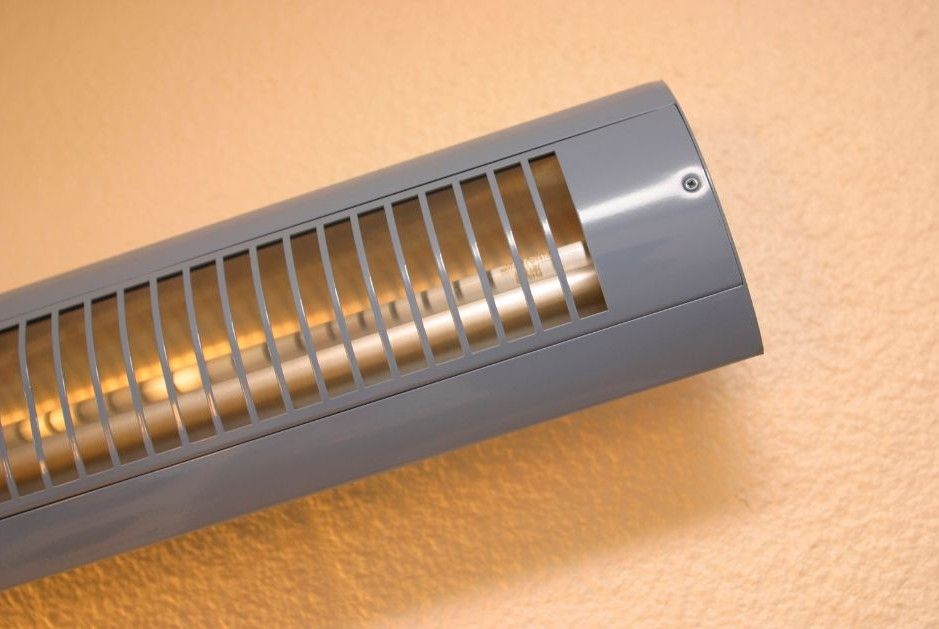 the best wall mounted electric outdoor heater on orange wall