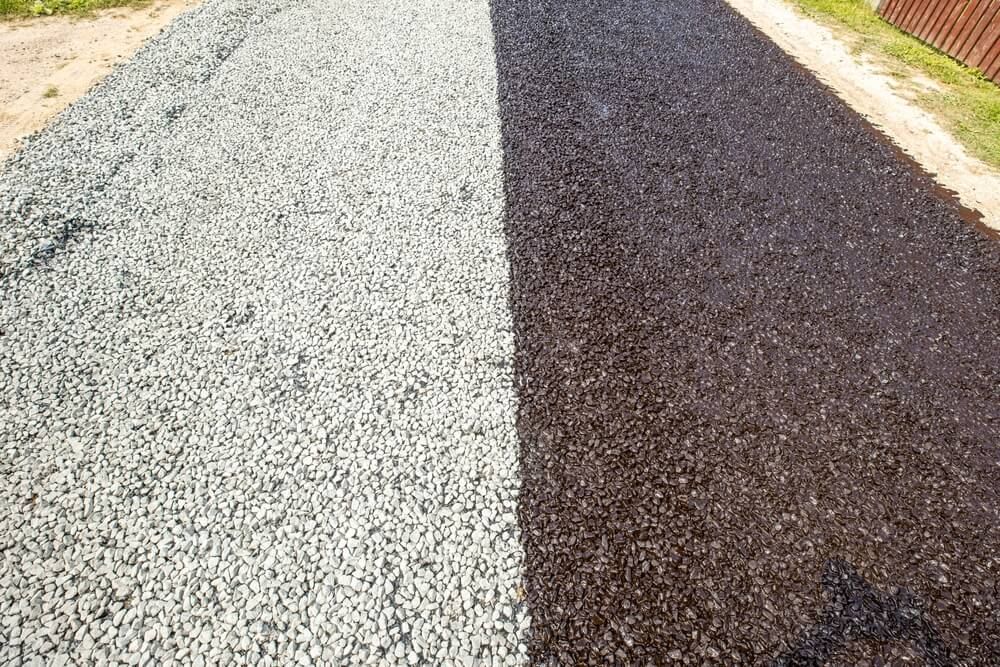 black and white resin gravel paved walkway jogging track or small road
