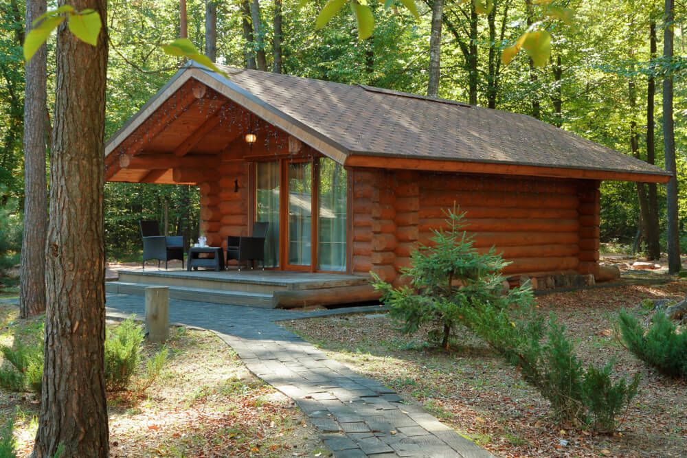 private wooden house cabin in the middle of the woods