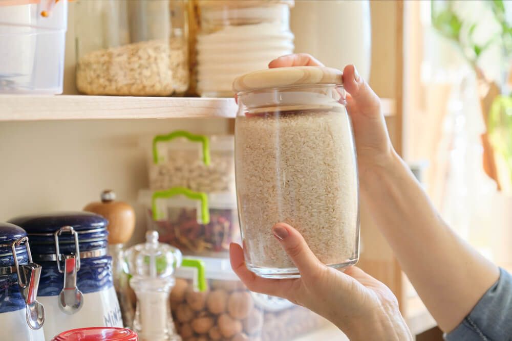 storing dried food products in jars for the kitchen pantry