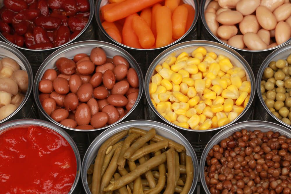 colorful canned veggies including peas corn and tomatoes