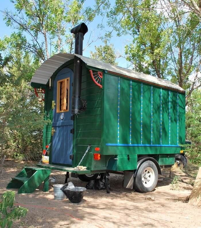 green gypsy wagon ready for adventure