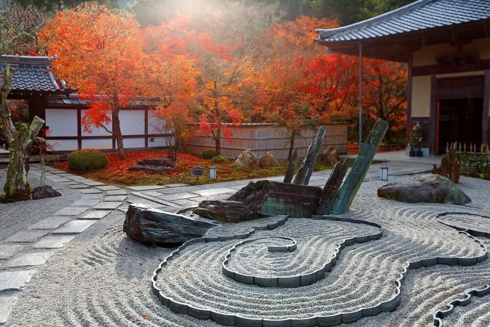 lovely autumn scenery of a zen rock garden with colorful foliage