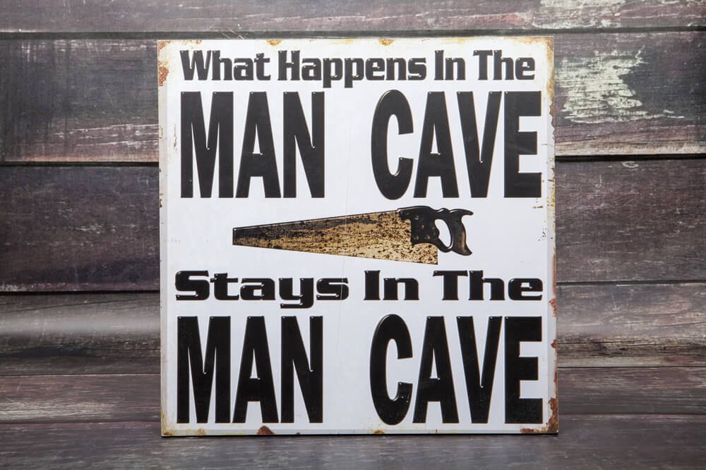 sign explaining that what happens in the man cave stays in the man cave