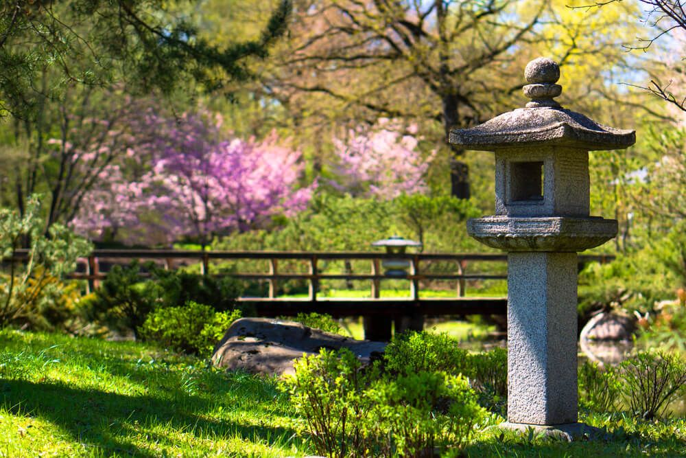 tranquil zen garden with stone lantern torch