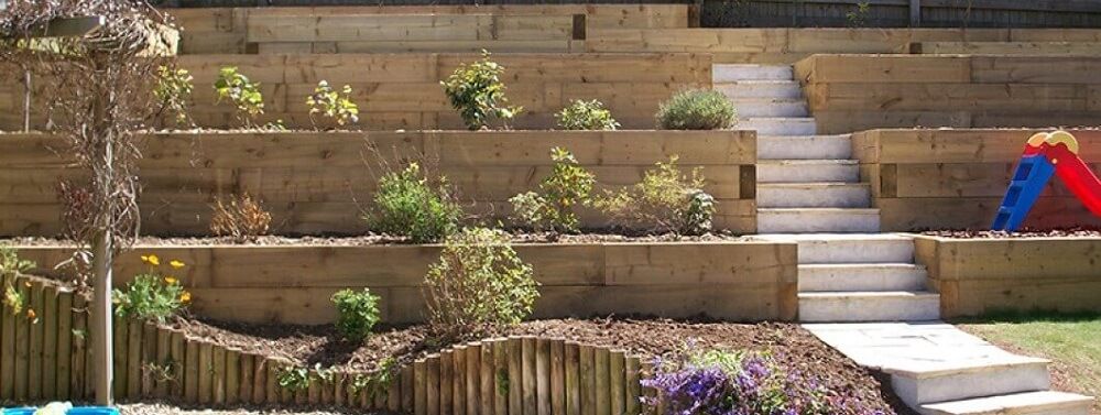 railway sleeper garden for sloped backyard retaining wall