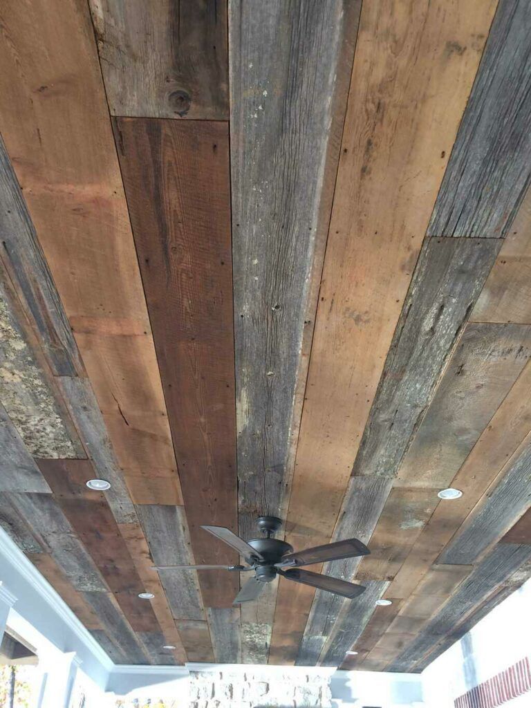 This rustic and well-constructed farm style ceiling is perfect for a front porch.