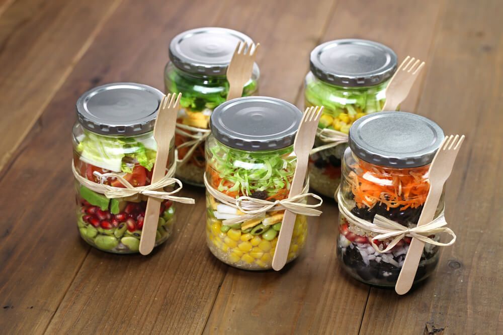Preserving delicious and nutritious garden veggies in glass jars.