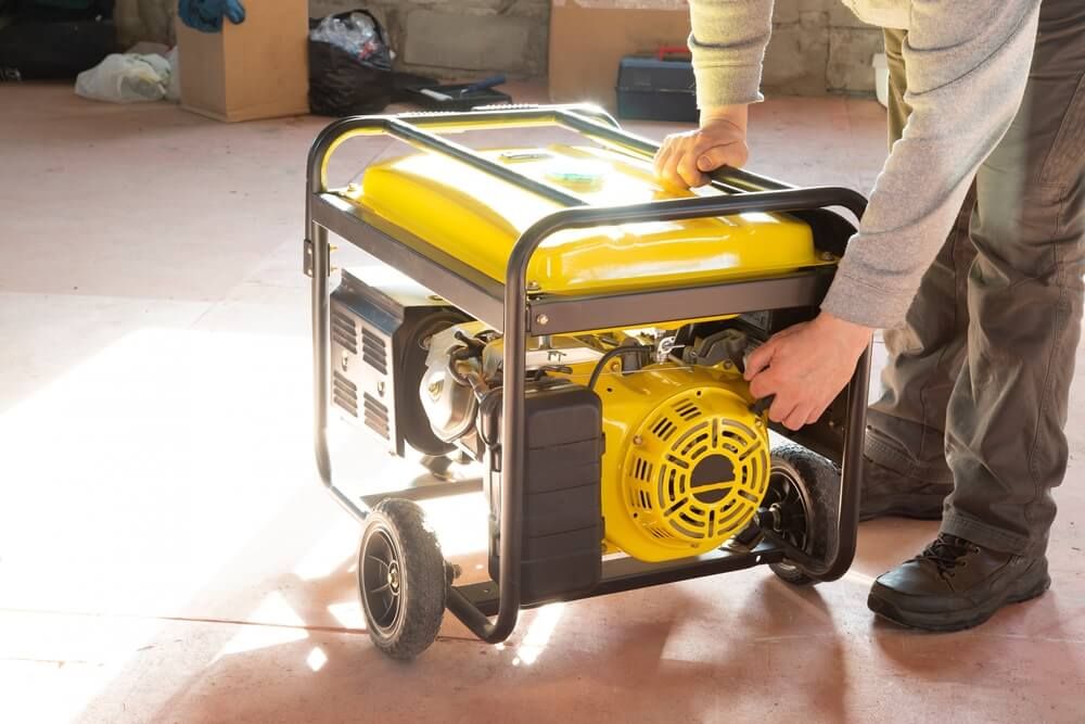 Using a portable gasoline generator for home energy backup.
